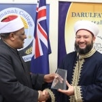 Dr Sheikh Salim Presenting a Souvenir to Prof Abbas